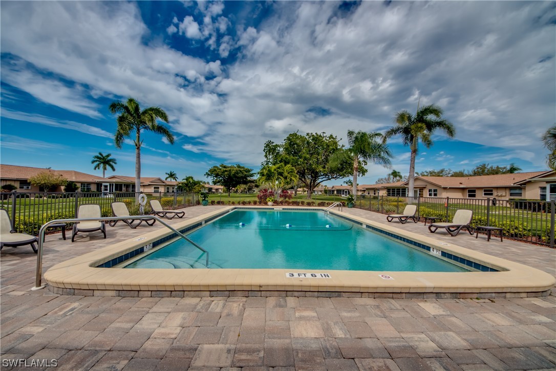 5585 Buring Court Fort Myers, FL 33919 - Photo 34 of 34 a view of outdoor kitchen with a swimming pool