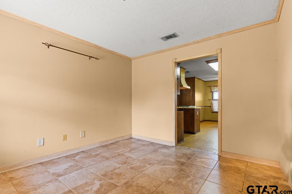 6404 Black Gum Road Gilmer, TX 75644 - Photo 18 of 45 a view of a room with a hallway