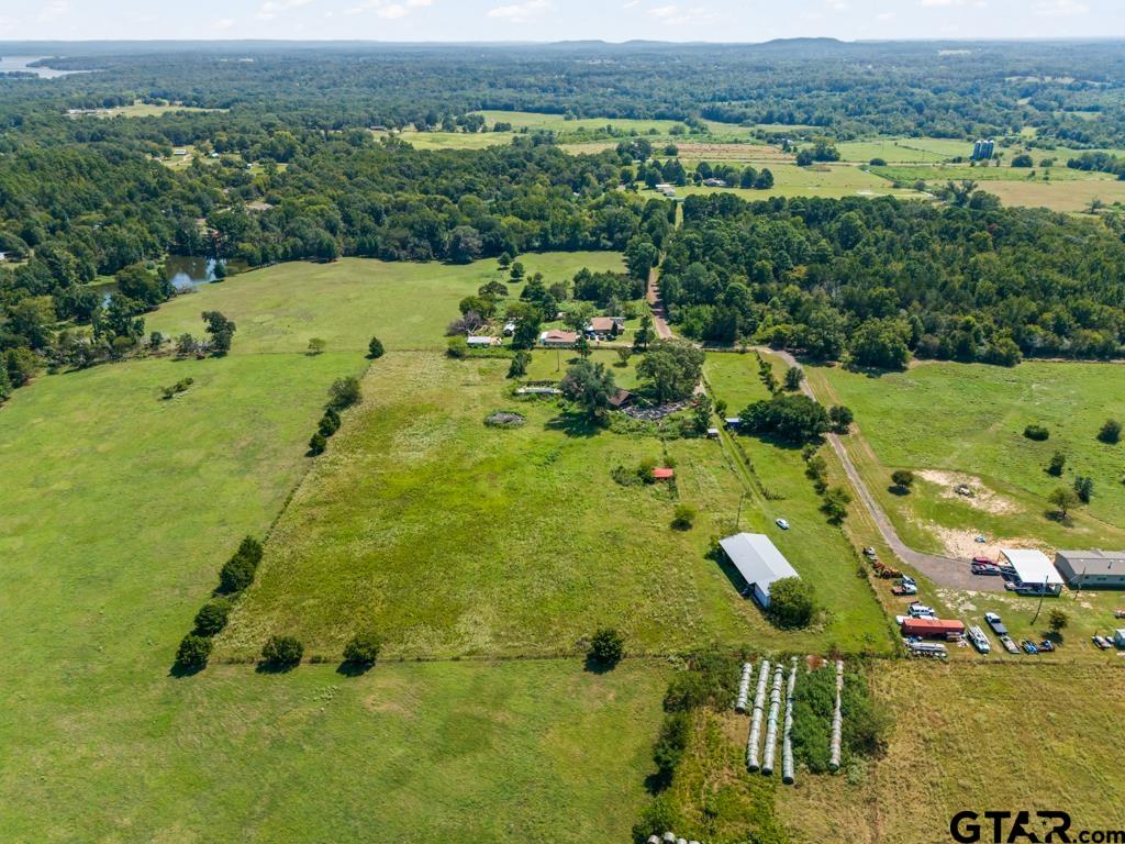 6404 Black Gum Road Gilmer, TX 75644 - Photo 27 of 45 a view of a lush green field