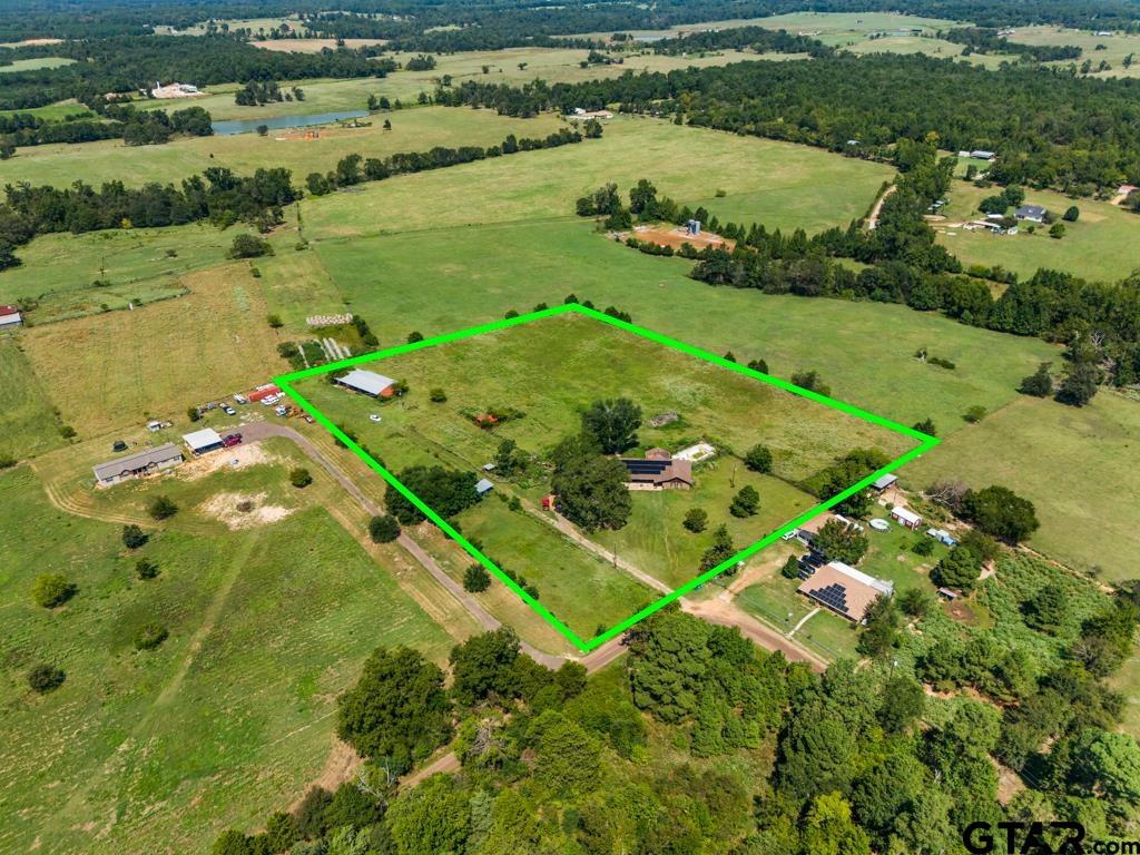 6404 Black Gum Road Gilmer, TX 75644 - Photo 28 of 45 a view of a lake with a city