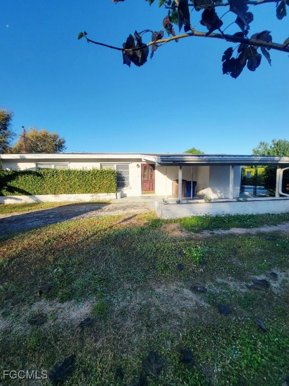 a view of a house with a big yard