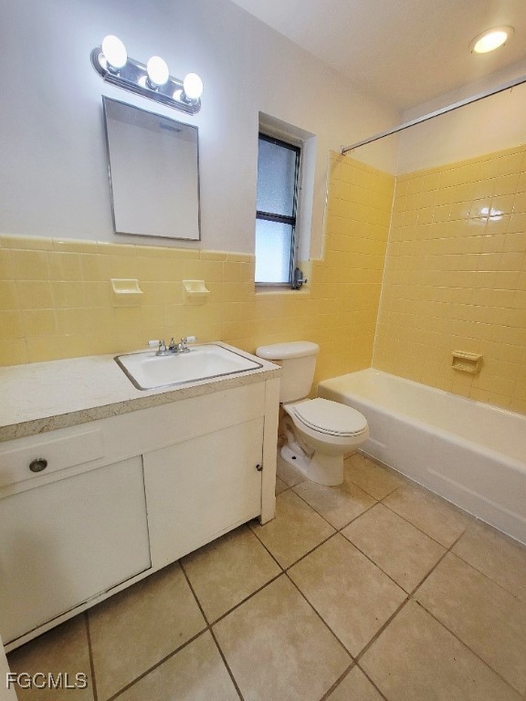 25 Maple Avenue North Lehigh Acres, FL 33936 - Photo 11 of 26 a bathroom with a double vanity sink mirror and toilet