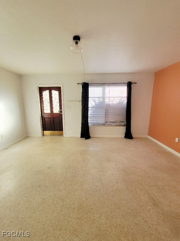 25 Maple Avenue North Lehigh Acres, FL 33936 - Photo 14 of 26 an empty room with windows