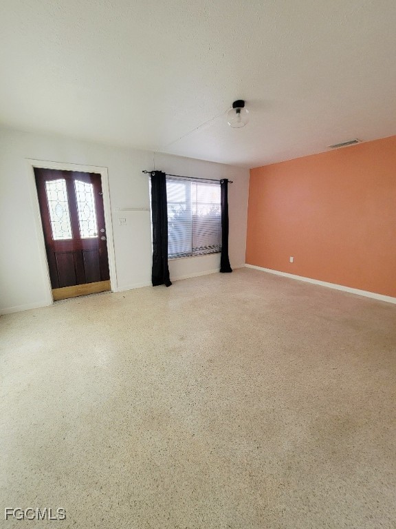 25 Maple Avenue North Lehigh Acres, FL 33936 - Photo 15 of 26 an empty room with windows and cabinet