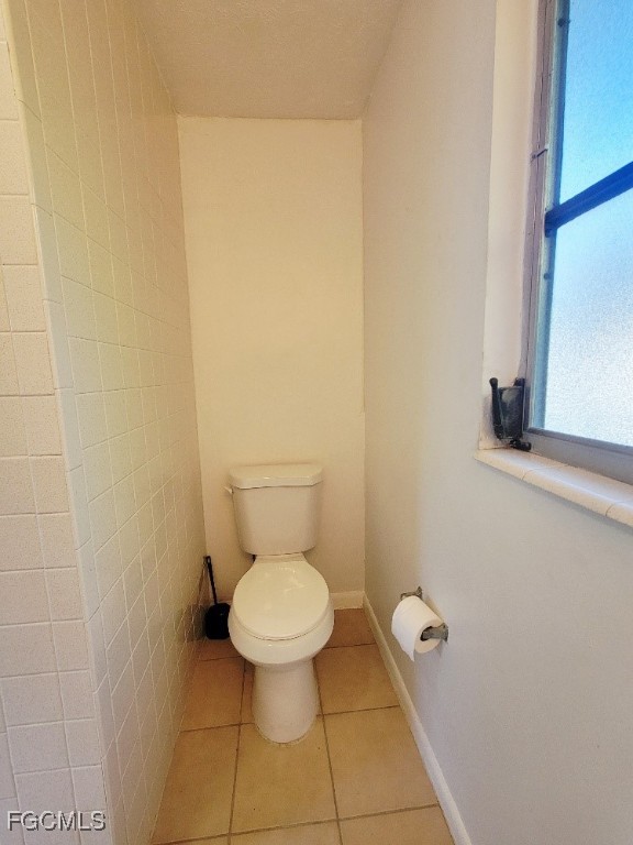 25 Maple Avenue North Lehigh Acres, FL 33936 - Photo 18 of 26 a bathroom with a toilet