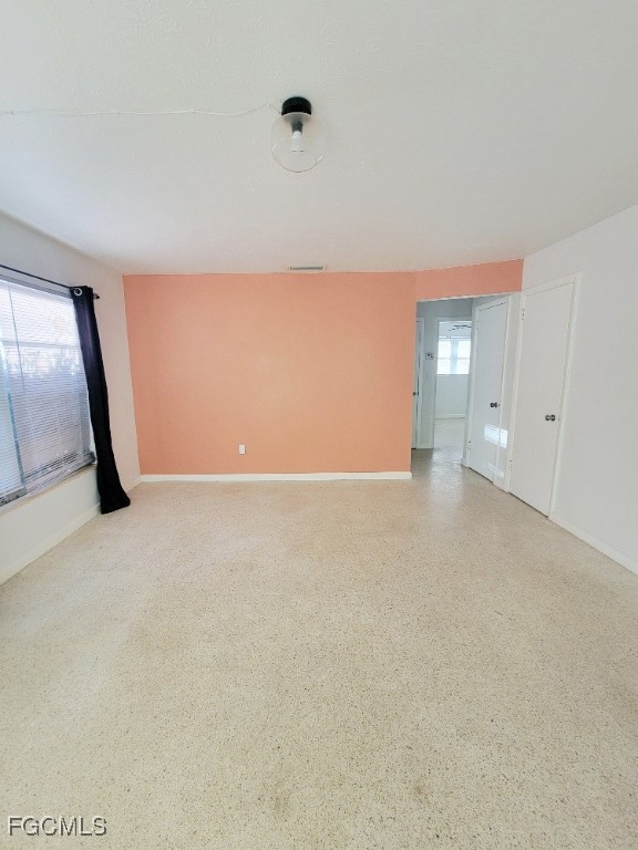 25 Maple Avenue North Lehigh Acres, FL 33936 - Photo 5 of 26 a view of an empty room