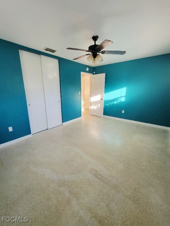 25 Maple Avenue North Lehigh Acres, FL 33936 - Photo 9 of 26 a view of a big room with a ceiling fan and a window