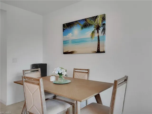 a view of a workspace with furniture