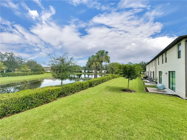 a view of a garden with a house