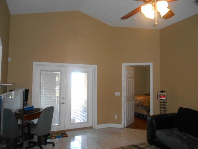 5780 Southeast Colee Avenue Stuart, FL 34997 - Photo 11 of 25 a workspace with furniture and a window