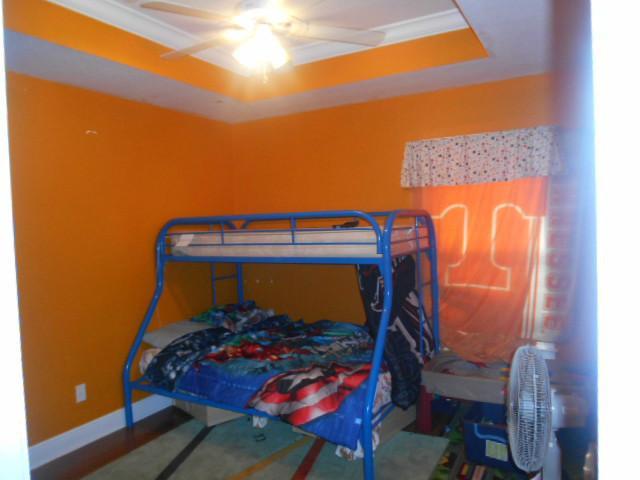 5780 Southeast Colee Avenue Stuart, FL 34997 - Photo 15 of 25 a bedroom with a bed and a closet