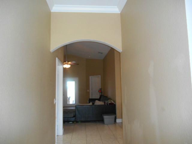 5780 Southeast Colee Avenue Stuart, FL 34997 - Photo 4 of 25 a room with a couch