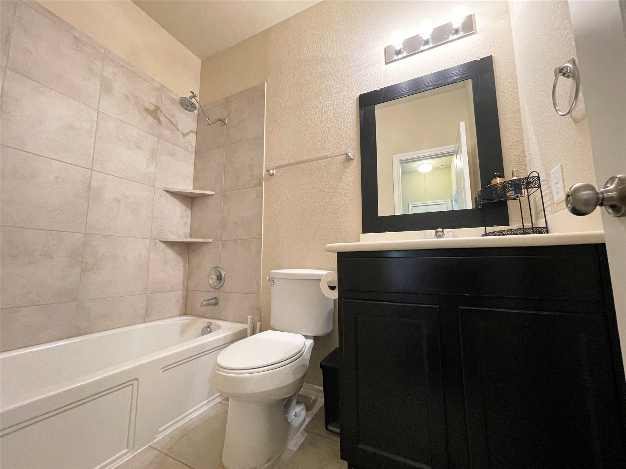3650 Sumner Lodge Drive Katy, TX 77449 - Photo 23 of 41 a bathroom with a sink a toilet and shower