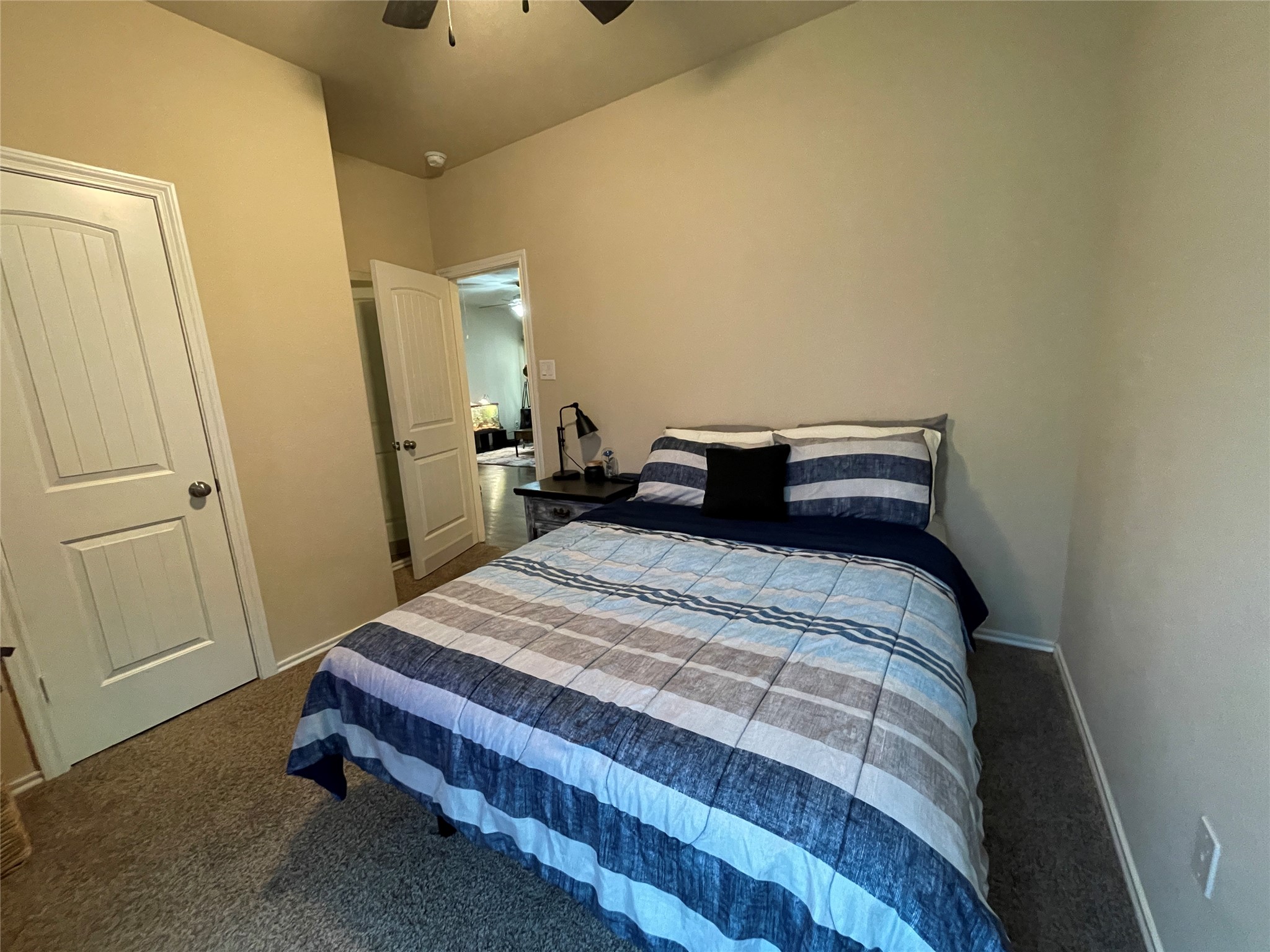 3650 Sumner Lodge Drive Katy, TX 77449 - Photo 26 of 41 a bedroom with a bed and a mirror