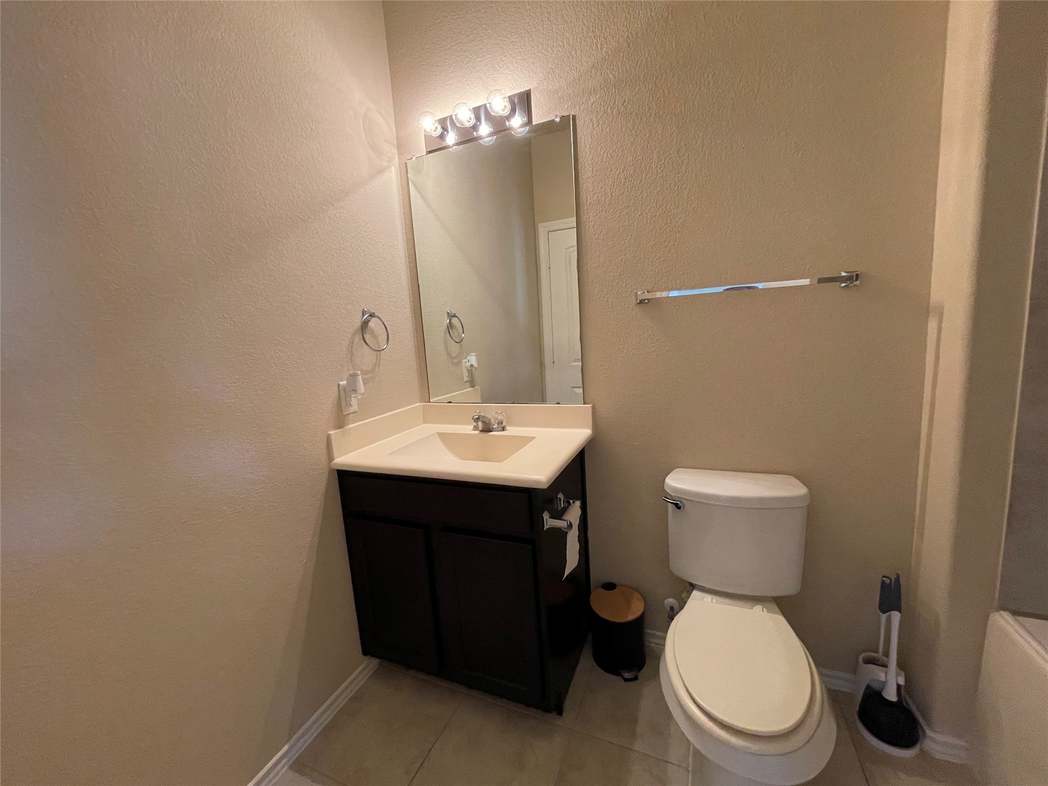 3650 Sumner Lodge Drive Katy, TX 77449 - Photo 37 of 41 a bathroom with a sink toilet and a mirror