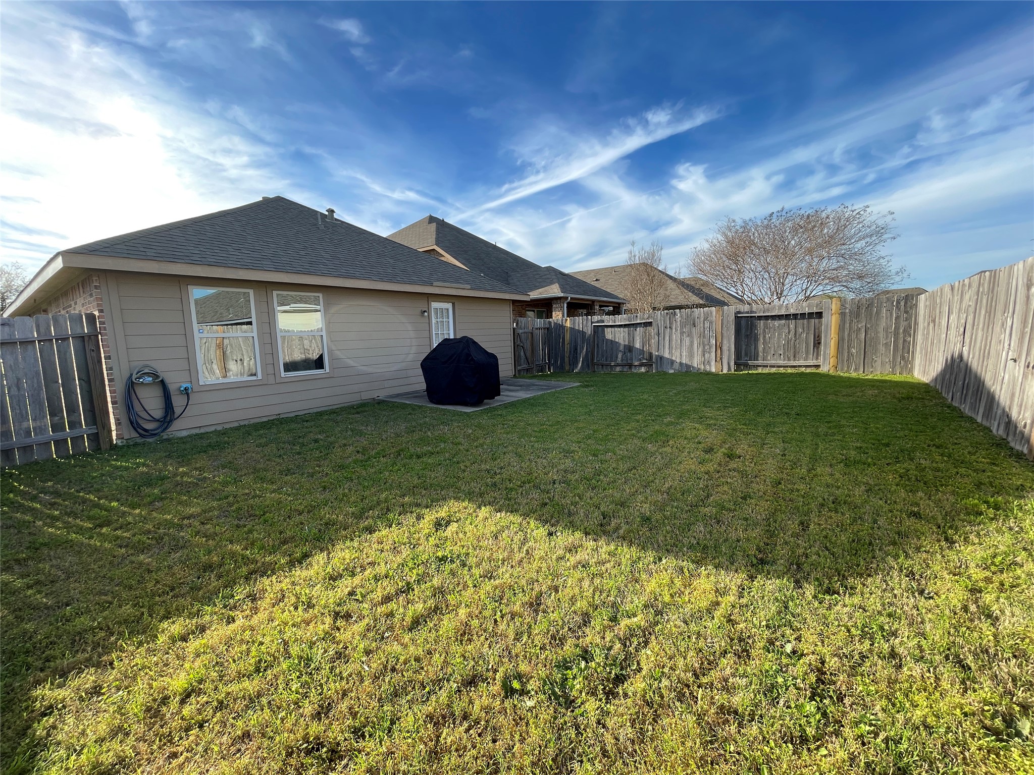 3650 Sumner Lodge Drive Katy, TX 77449 - Photo 40 of 41 a view of a yard in front of a house with a large tree