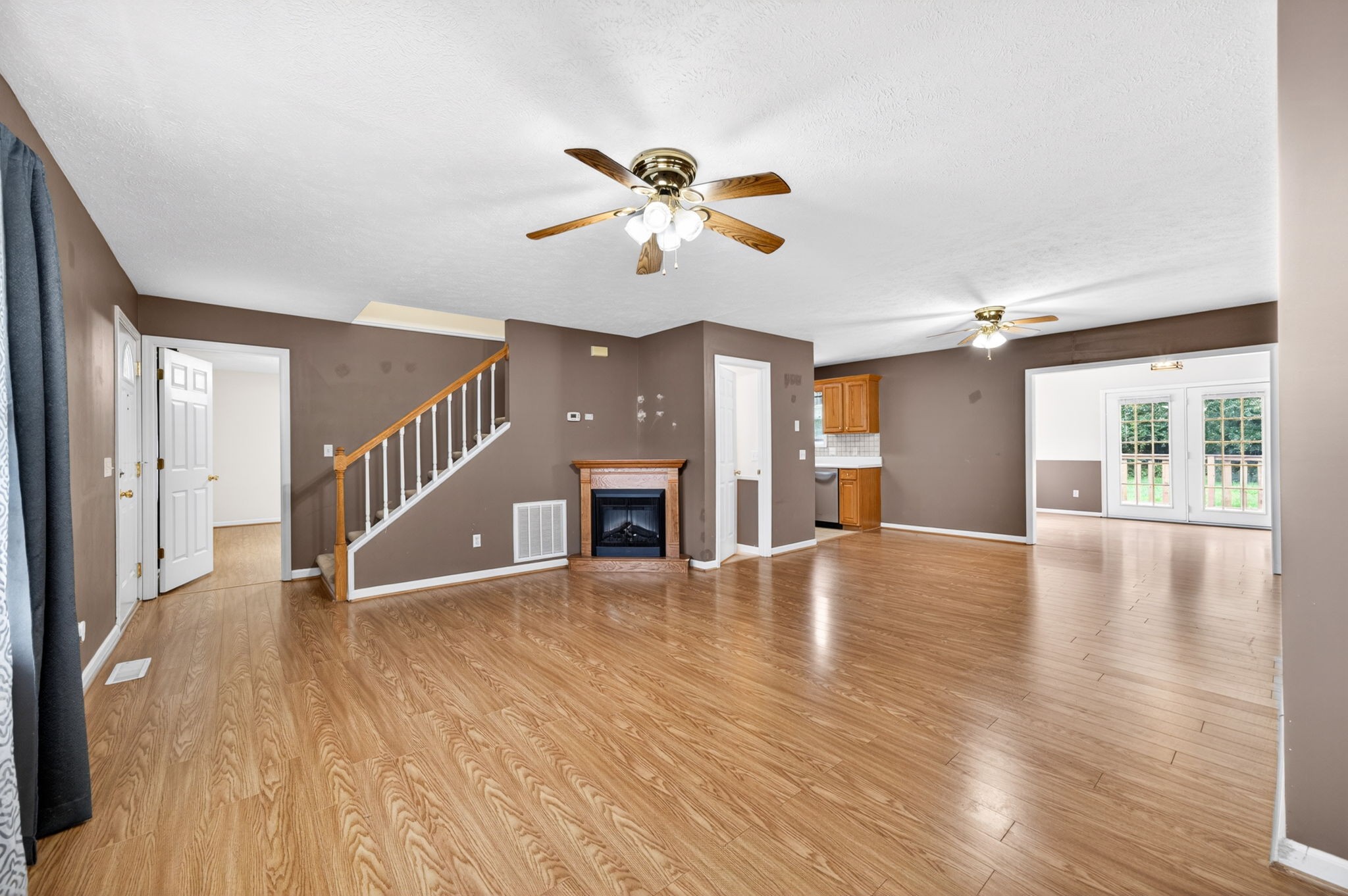 291 Poplar Point Lane Rickman, TN 38580 - Photo 2 of 41 a view of an empty room with wooden floor and a window