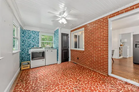 a view of a hallway with a chandelier