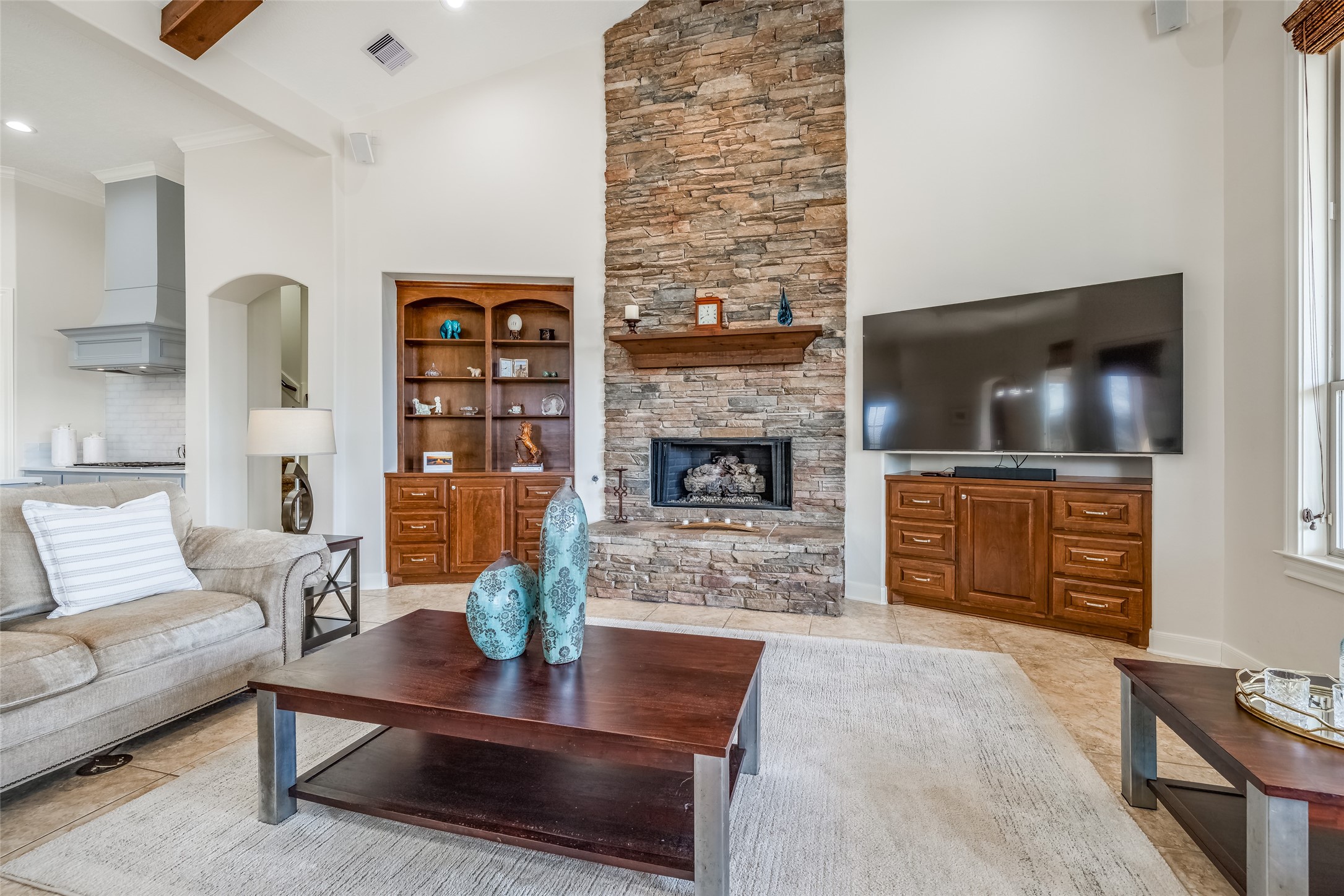 31102 Lower Oxbow Trace Fulshear, TX 77441 - Photo 17 of 50 a living room with furniture and a fireplace