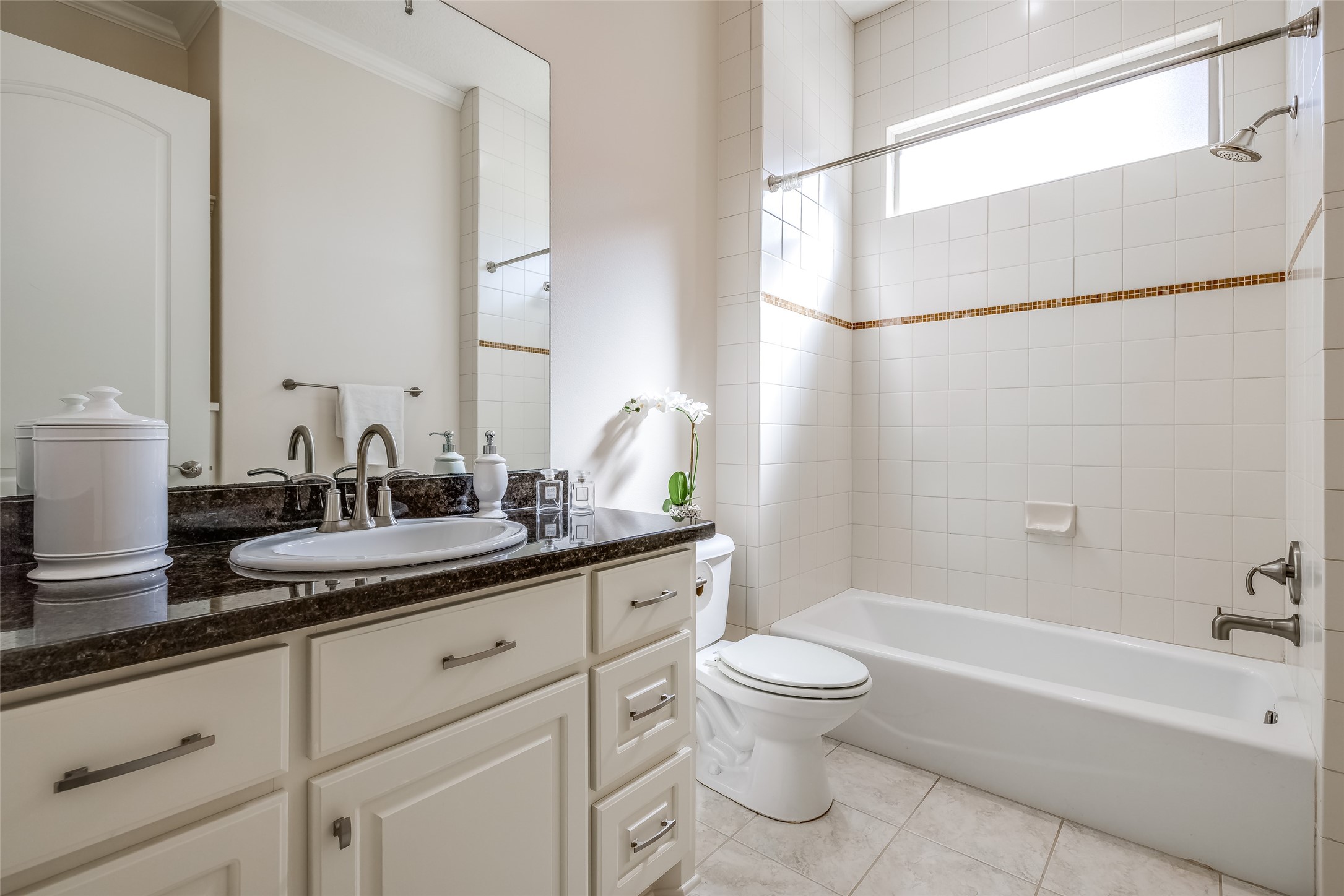 31102 Lower Oxbow Trace Fulshear, TX 77441 - Photo 29 of 50 a bathroom with a granite countertop bathtub shower sink vanity and toilet