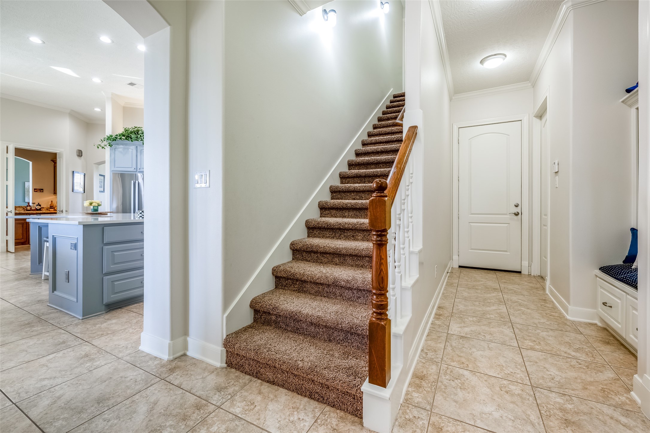 31102 Lower Oxbow Trace Fulshear, TX 77441 - Photo 34 of 50 a view of a hallway with kitchen and entryway