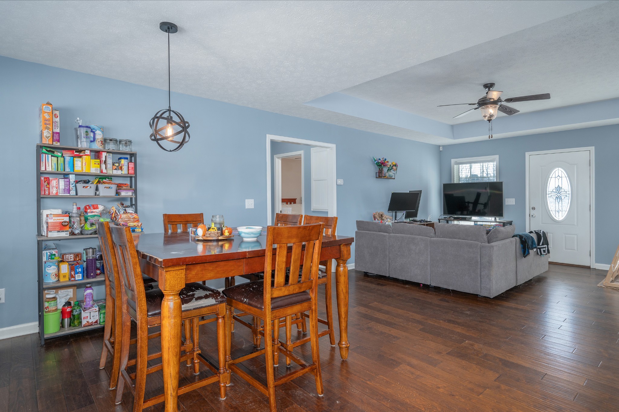 2995 Oak Grove Church Road Bethpage, TN 37022 - Photo 6 of 28 a living room with furniture a flat screen tv and a table