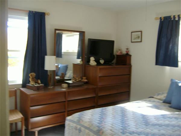 61 Hollis Road Lunenburg, MA 01462 - Photo 14 of 27 a room with a bed and a television