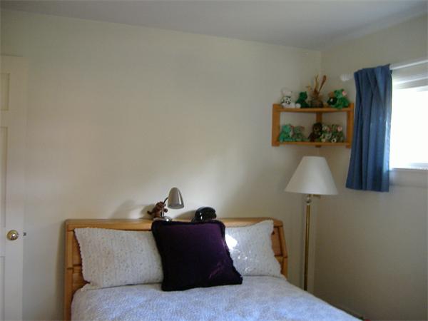 61 Hollis Road Lunenburg, MA 01462 - Photo 15 of 27 a living room with furniture and a lamp