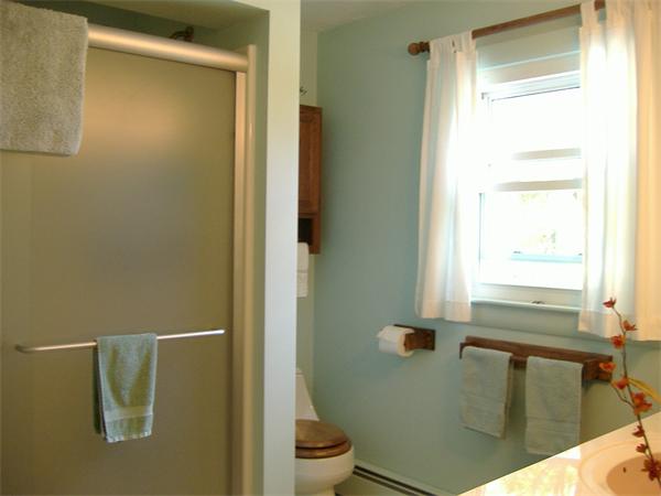 61 Hollis Road Lunenburg, MA 01462 - Photo 18 of 27 a bathroom with a sink and a toilet