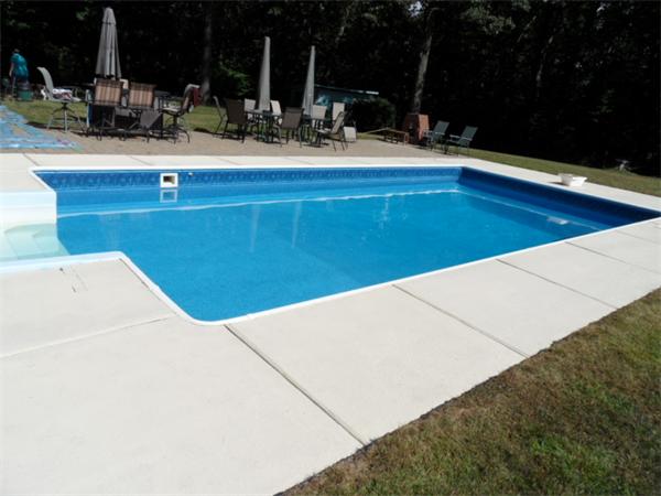 61 Hollis Road Lunenburg, MA 01462 - Photo 20 of 27 a sink with pool and wooden bench