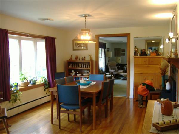 61 Hollis Road Lunenburg, MA 01462 - Photo 3 of 27 a view of a dining room with furniture window and wooden floor