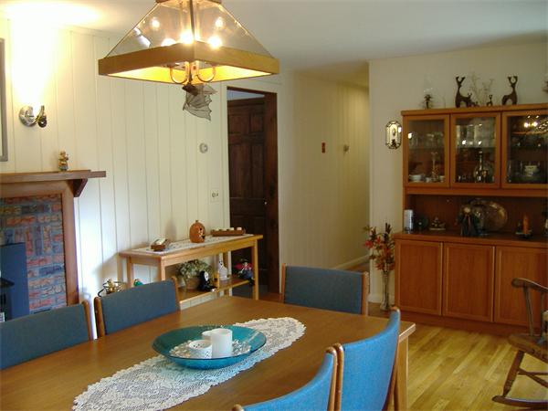 61 Hollis Road Lunenburg, MA 01462 - Photo 5 of 27 a living room with furniture and a table