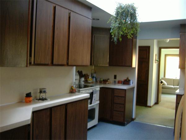 61 Hollis Road Lunenburg, MA 01462 - Photo 6 of 27 a kitchen with a sink and cabinets