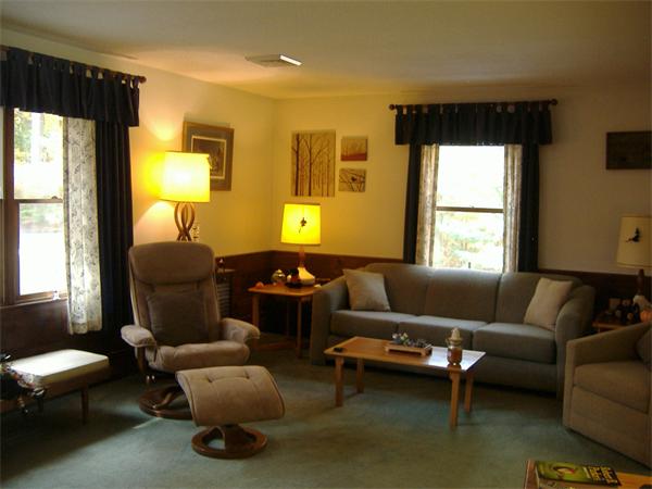 61 Hollis Road Lunenburg, MA 01462 - Photo 9 of 27 a living room with furniture and a window