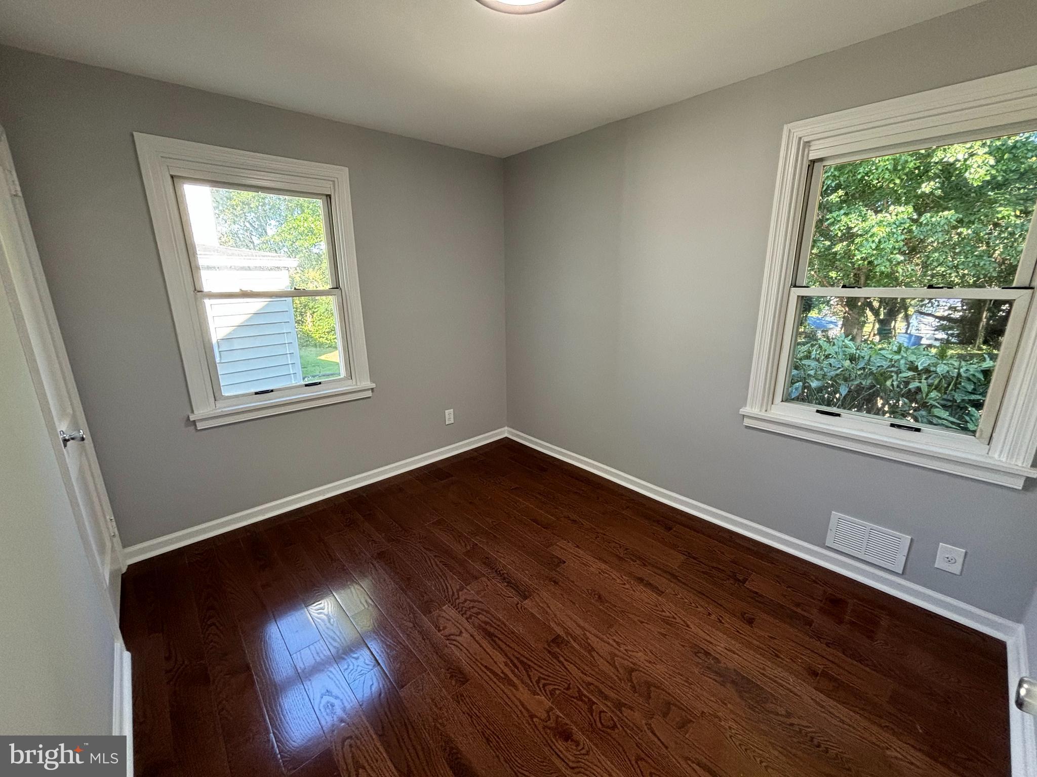 2507 Mason Street Silver Spring, MD 20902 - Photo 16 of 49 an empty room with wooden floor and windows