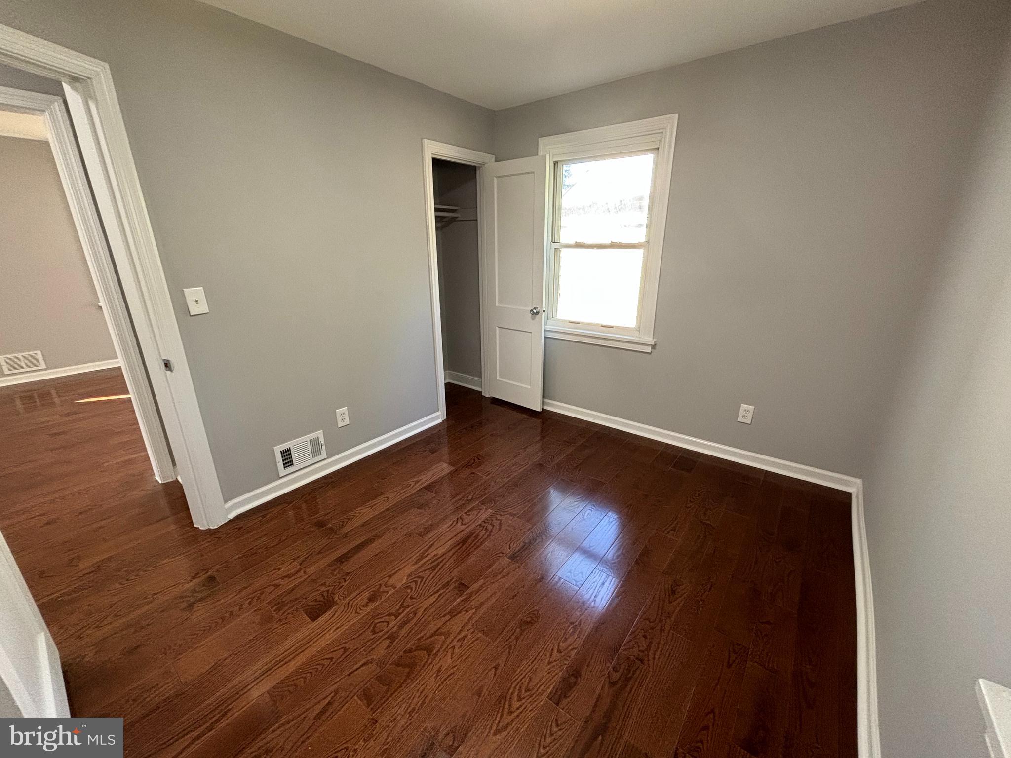 2507 Mason Street Silver Spring, MD 20902 - Photo 17 of 49 an empty room with wooden floor and windows