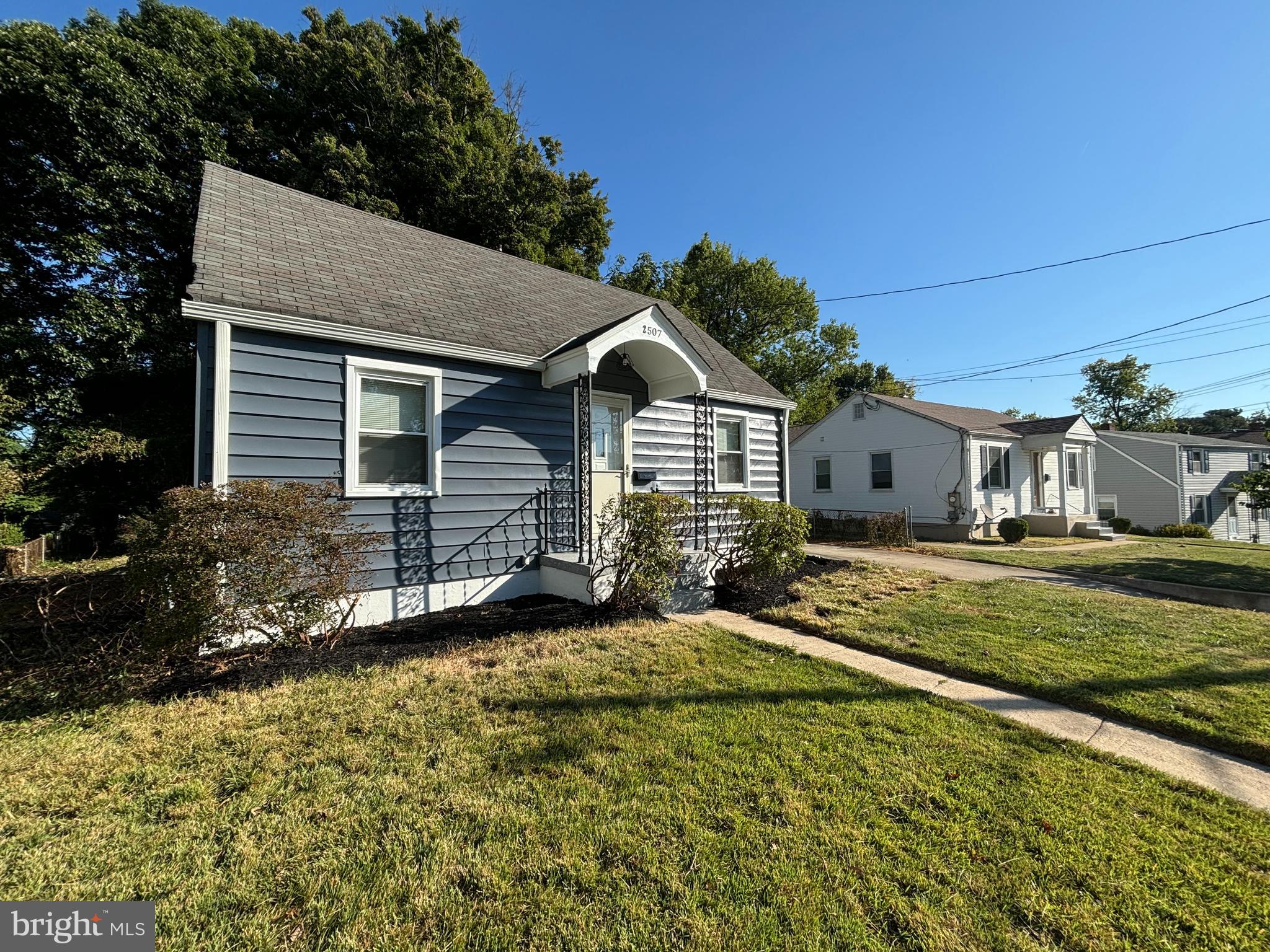 2507 Mason Street Silver Spring, MD 20902 - Photo 3 of 49 a front view of a house with a yard