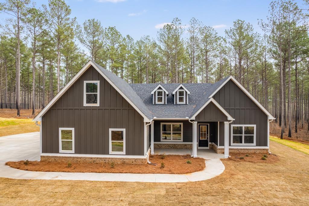 1227 Attaway Road Roopville, GA 30170 - Photo 1 of 1 a front view of a house with yard