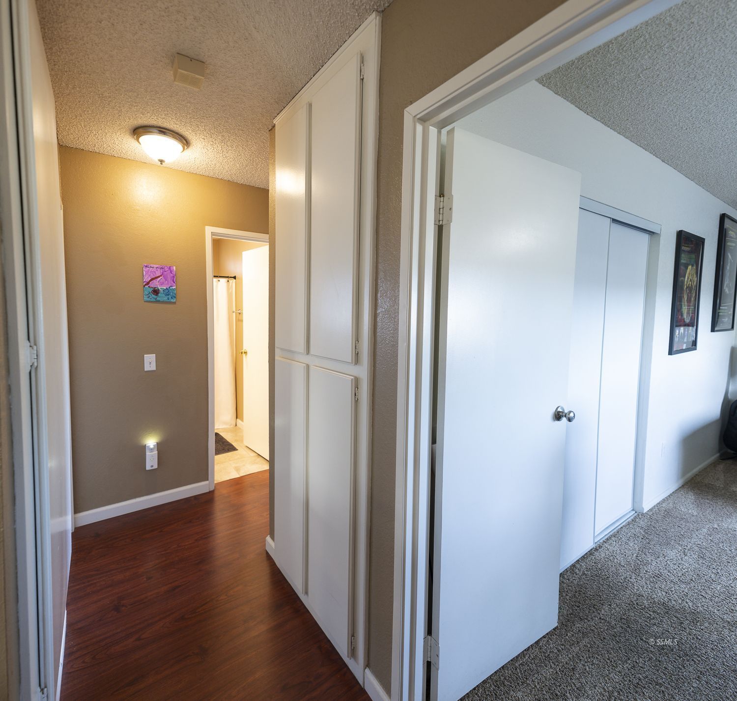 800 South Sanders Street Ridgecrest, CA 93555 - Photo 11 of 33 a view of a hallway with wooden floor