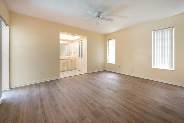 a bathroom with a shower and a sink