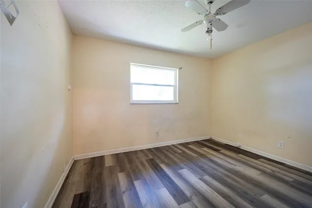 a view of a backyard with a patio