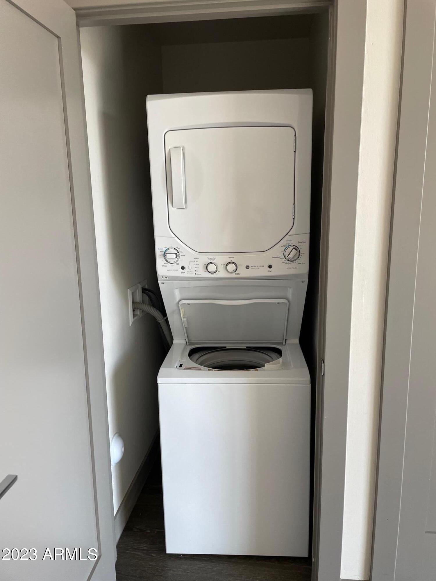 425 West Osborn Road, Unit 318 Phoenix, AZ 85013 - Photo 12 of 29 a utility room with dryer and washer