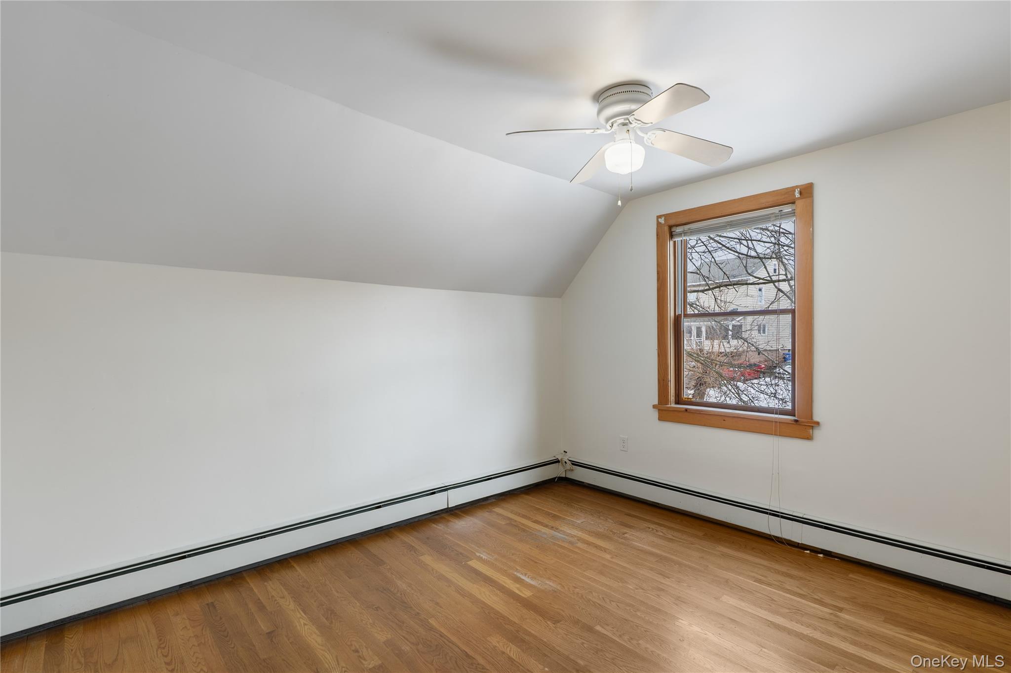 Undisclosed Address Middletown, NY 10940 - Photo 16 of 24 wooden floor in an empty room with a window