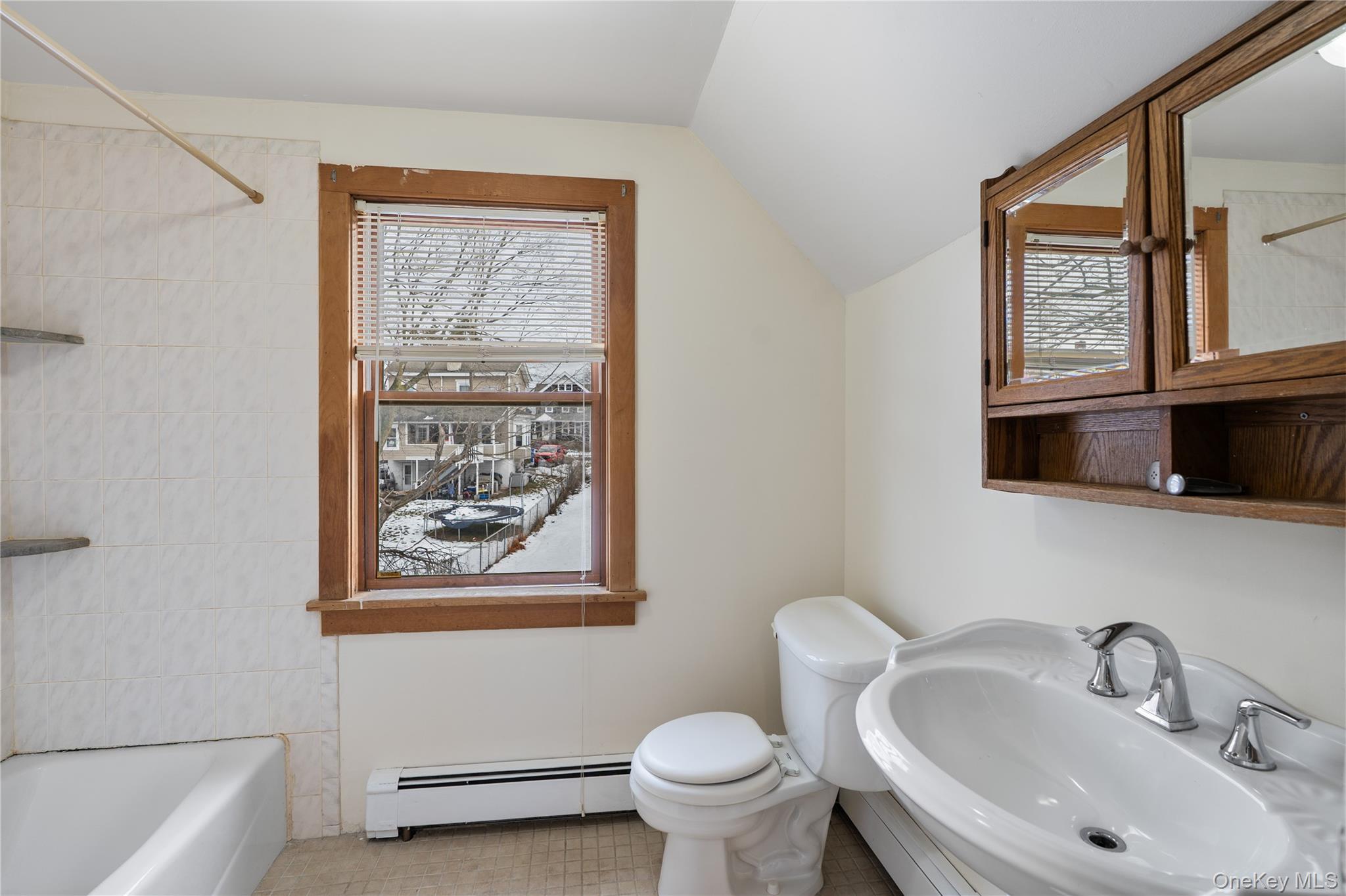 Undisclosed Address Middletown, NY 10940 - Photo 18 of 24 a bathroom with a toilet a sink and a bathtub