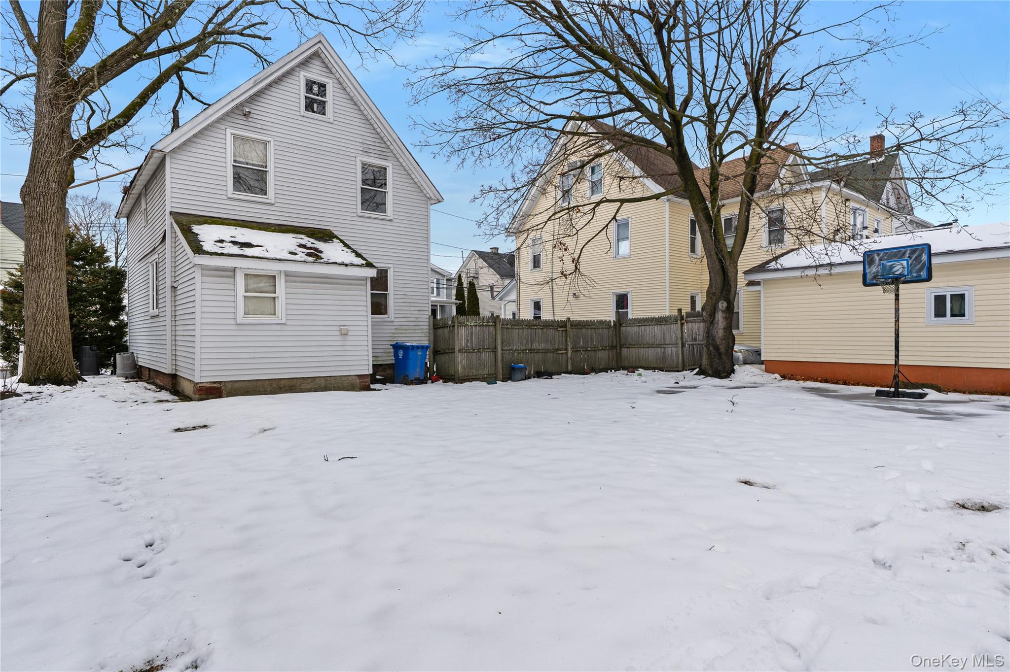 Undisclosed Address Middletown, NY 10940 - Photo 23 of 24 a view of a house with a snow in the yard