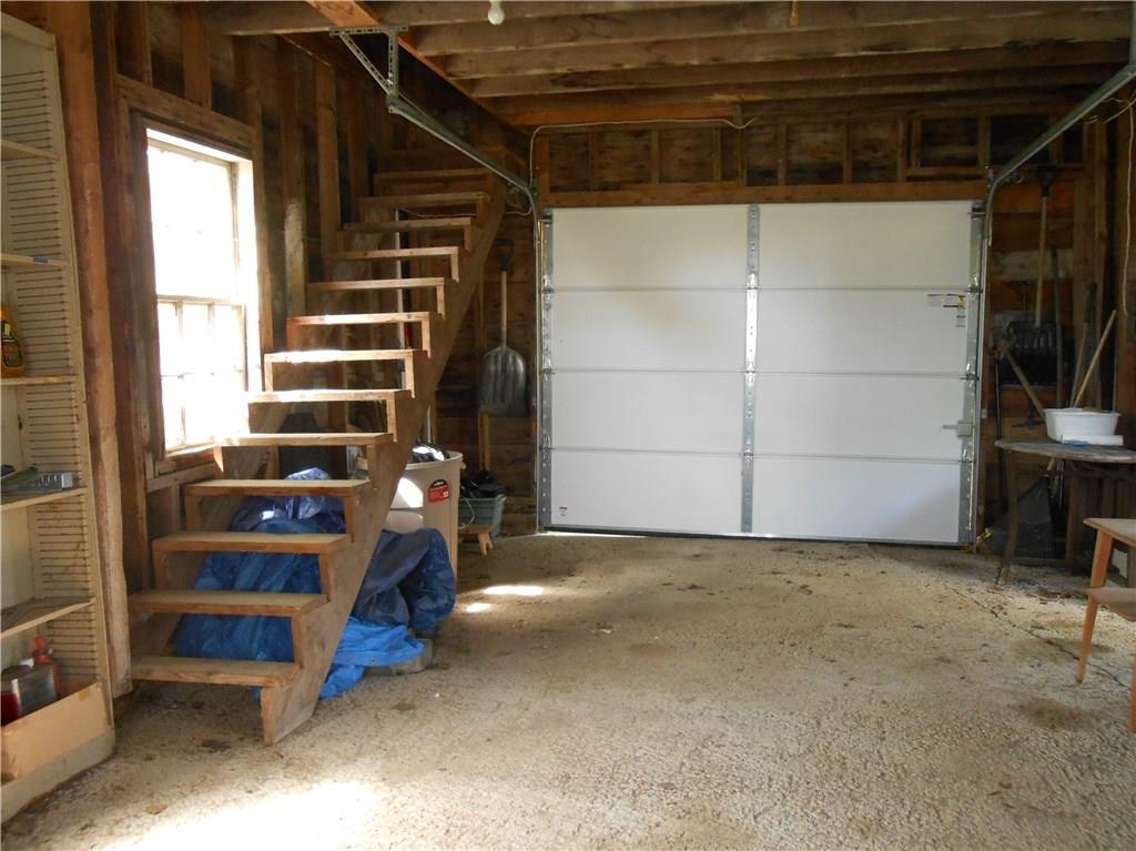 146 Southern Bay Road Penobscot, ME 04476 - Photo 18 of 19 Garage with storage above.