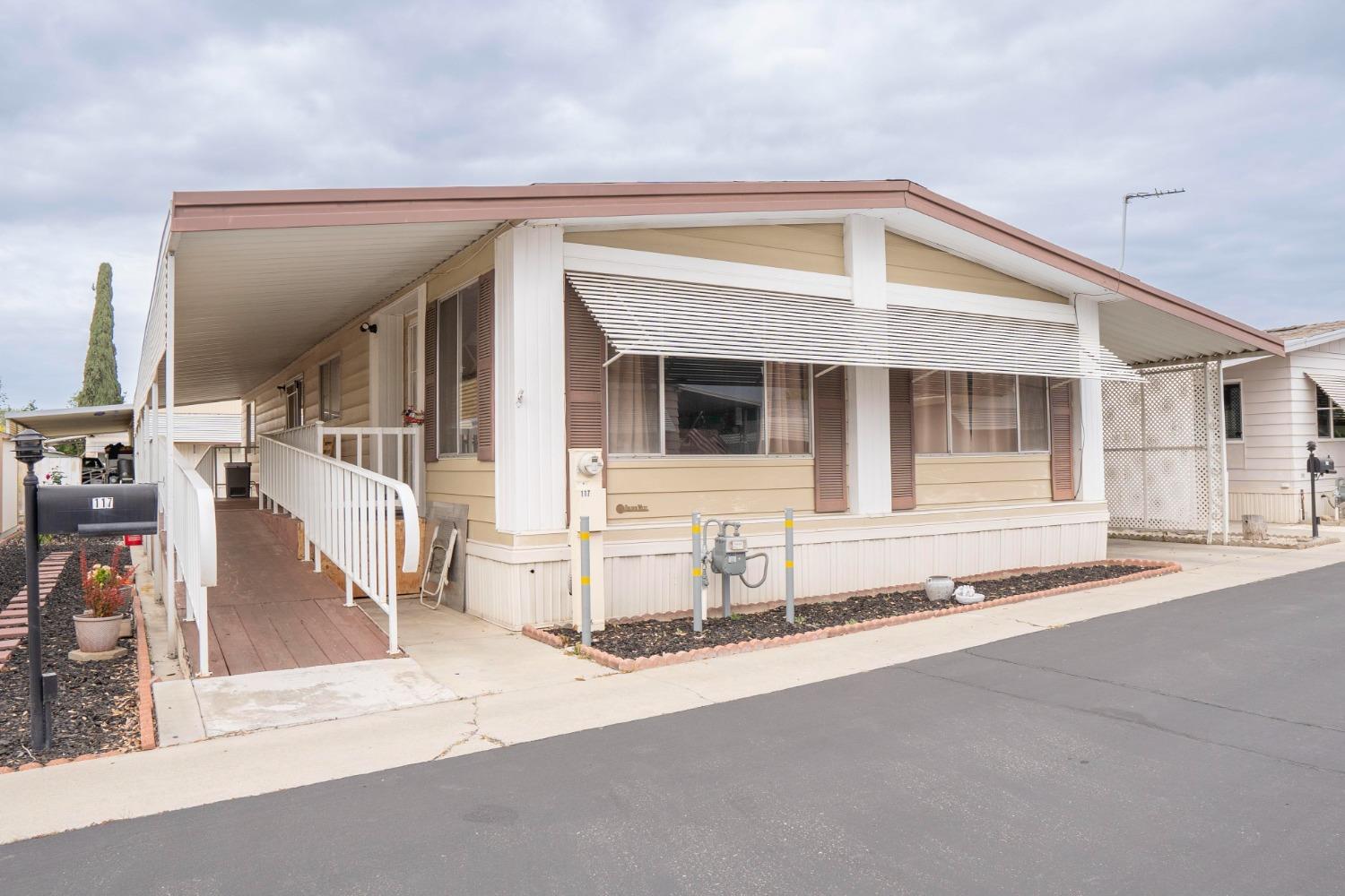 1500 Villa Avenue, Unit 117 Clovis, CA 93612 - Photo 1 of 31 a view of a house with a street