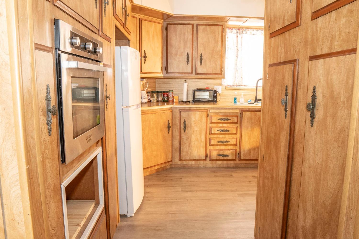 1500 Villa Avenue, Unit 117 Clovis, CA 93612 - Photo 11 of 31 a view of a bathroom with a shower and a window