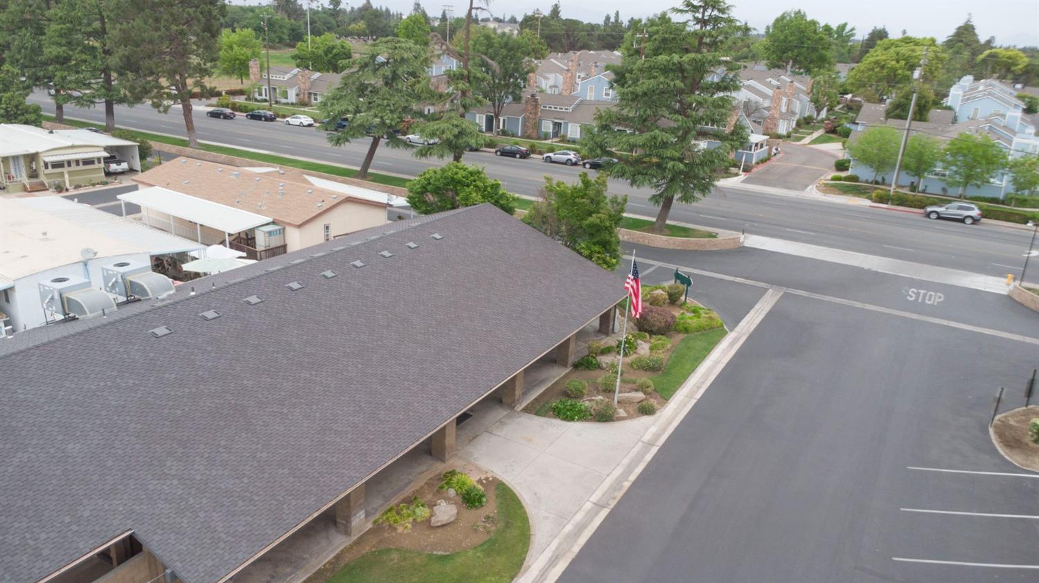 1500 Villa Avenue, Unit 117 Clovis, CA 93612 - Photo 30 of 31 an aerial view of a house with a garden and pool