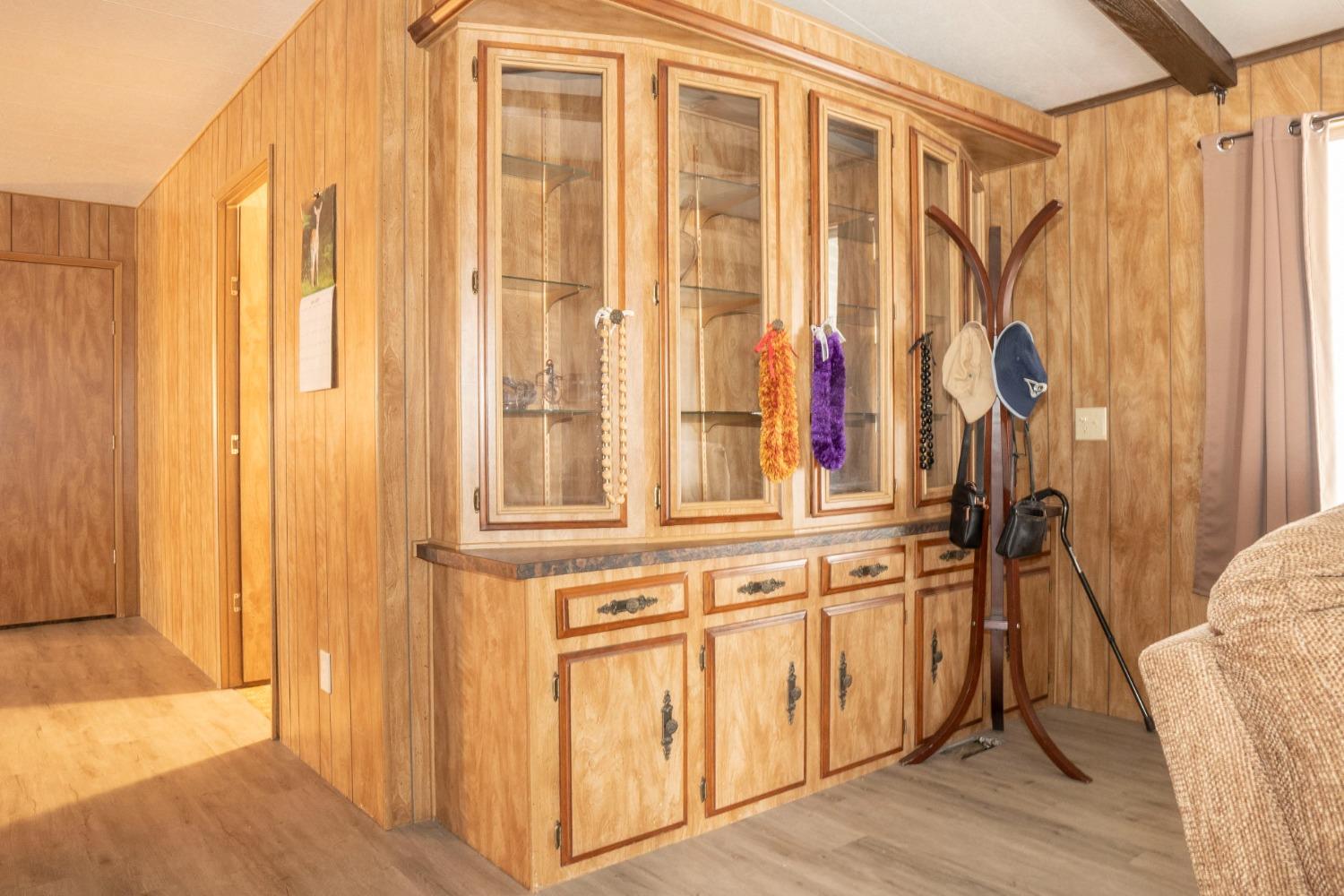 1500 Villa Avenue, Unit 117 Clovis, CA 93612 - Photo 9 of 31 a view of a bedroom with wooden floor and windows